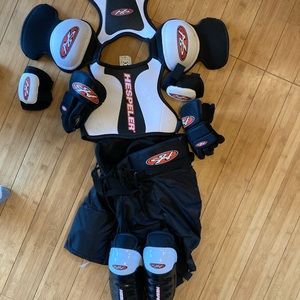 Ice hockey shin pads, pants, elbow pads , shoulder pads, chest/back pads. Gloves